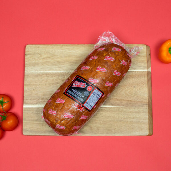 Pork Boneless Deli Style smoked ham on cutting board